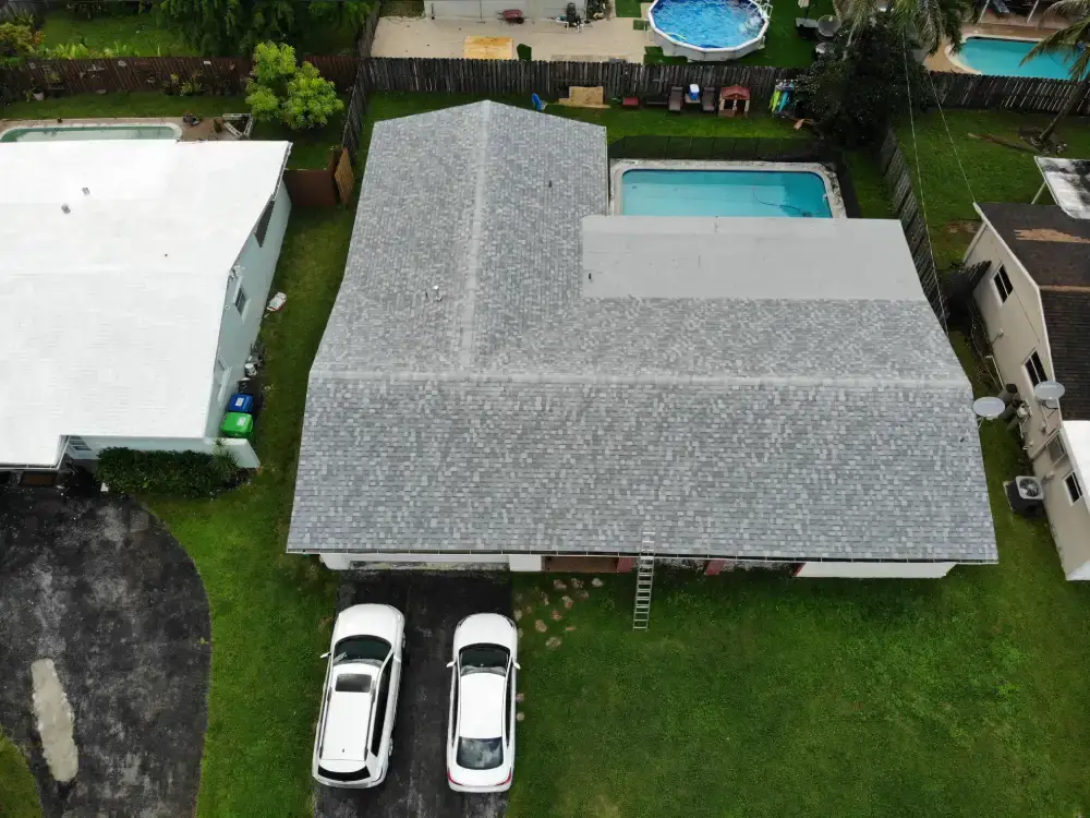 Finished flat and shingle roof system seen from above
